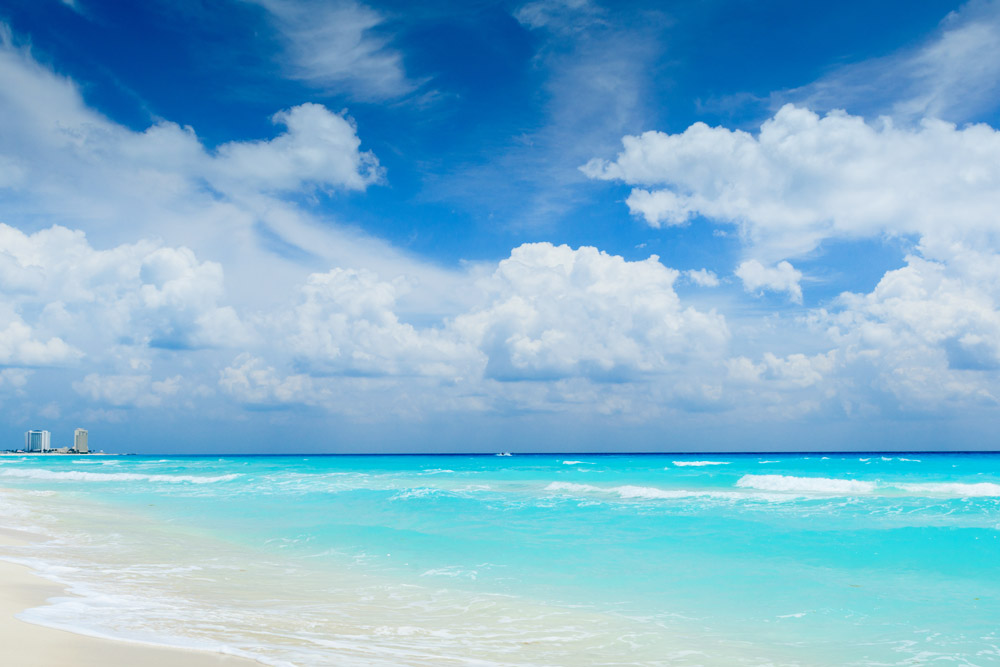 Lectura en las playas de Cancún